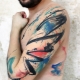 Ποικιλία ανδρικών τατουάζ στο ύφος της αφαίρεσης