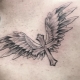 Variety of tattoo in the form of wings on the back for men